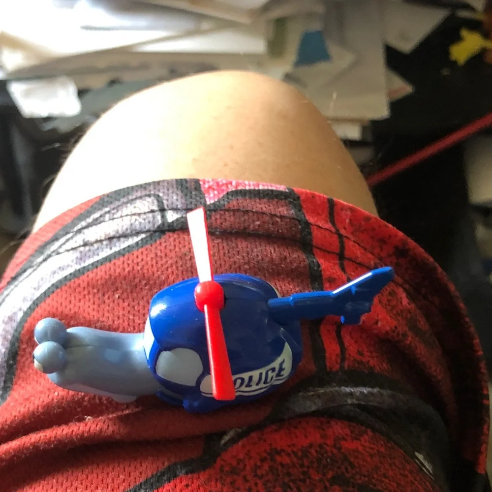 Blue Toy Helicopter with Red Rotor